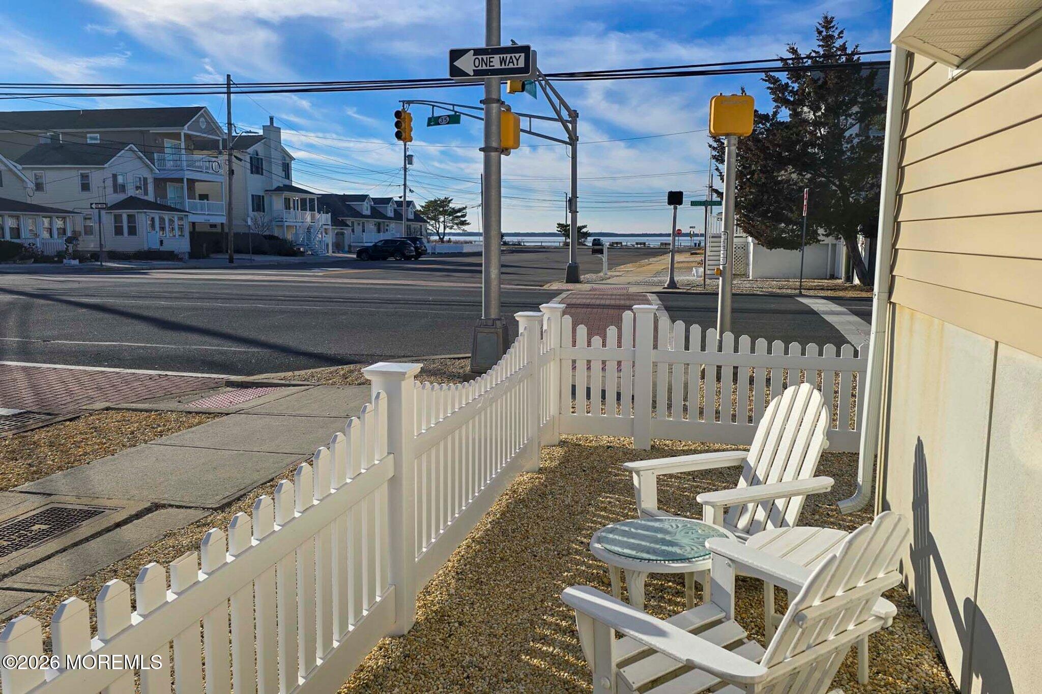 111 President Avenue Lavallette, NJ 08735 - Photo 37 of 54 a view of balcony with two chairs and a table