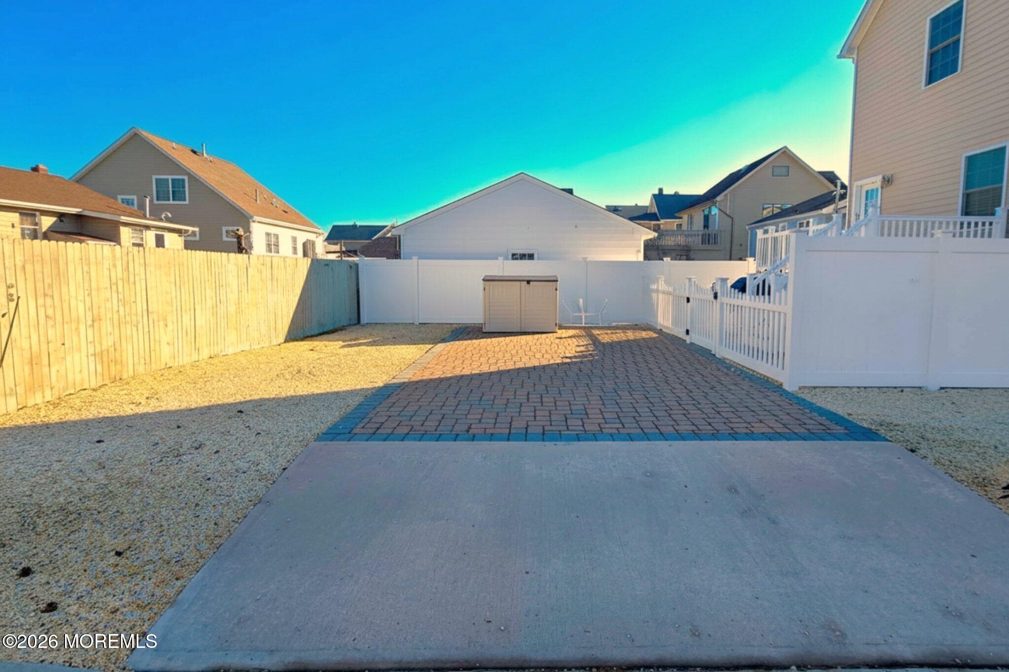 111 President Avenue Lavallette, NJ 08735 - Photo 40 of 54 a view of a house with a yard and a garage