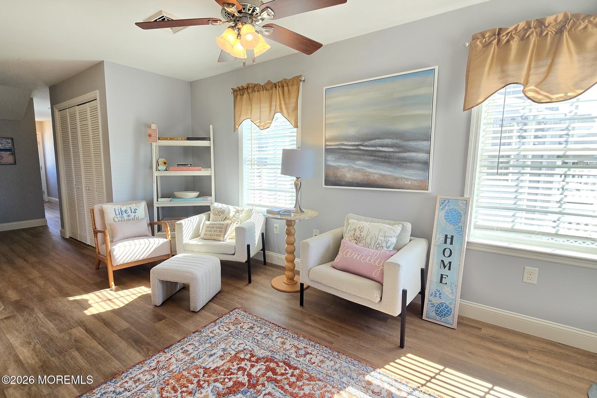 111 President Avenue Lavallette, NJ 08735 - Photo 7 of 54 a living room with furniture and a large window