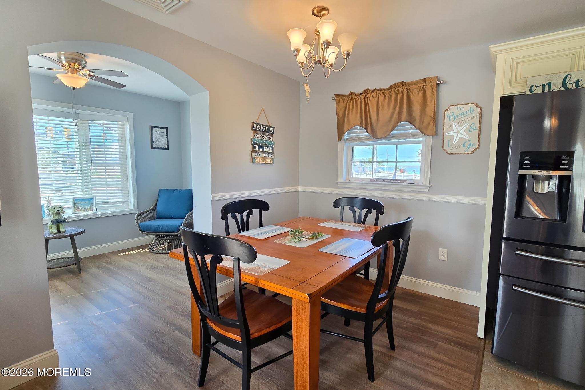 111 President Avenue Lavallette, NJ 08735 - Photo 10 of 54 a view of a dining room with furniture window and wooden floor