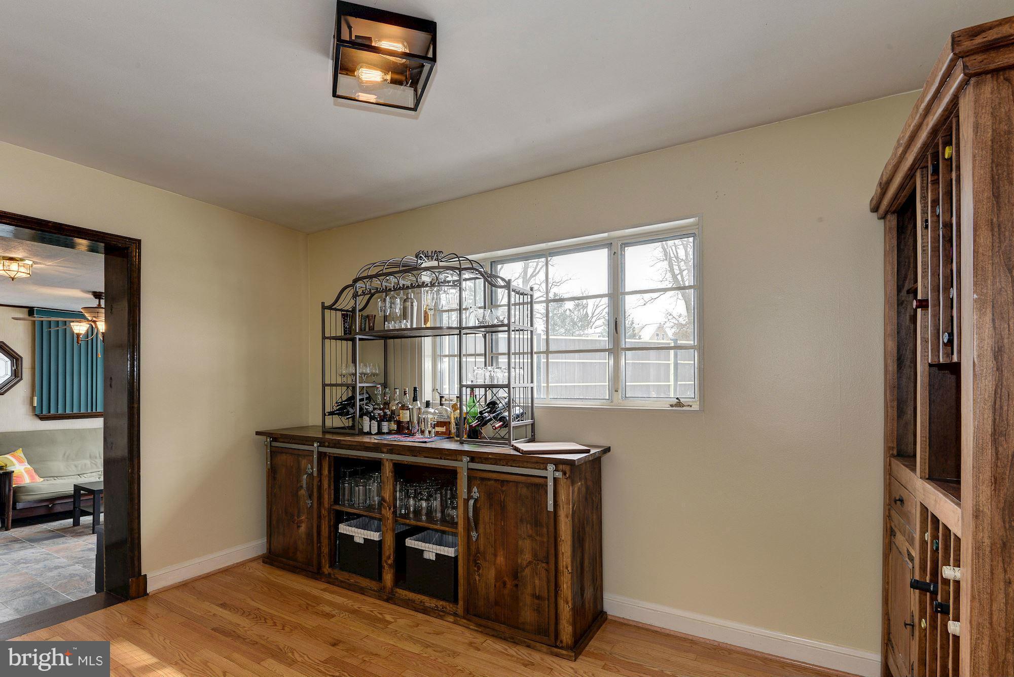1301 Chalmers Road Silver Spring, MD 20903 - Photo 11 of 28 a view of a workspace with furniture and window