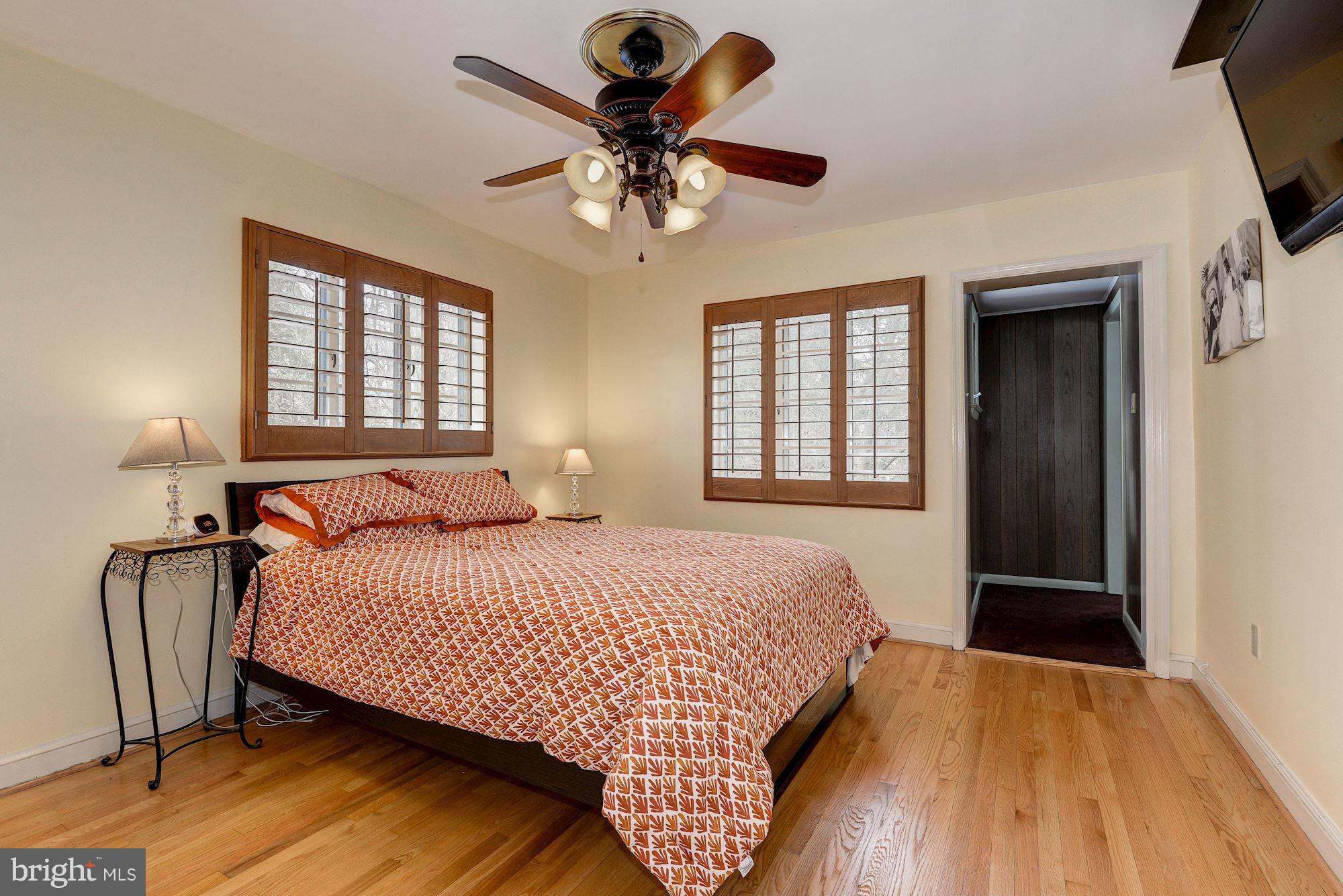 1301 Chalmers Road Silver Spring, MD 20903 - Photo 15 of 28 a bedroom with a bed and window
