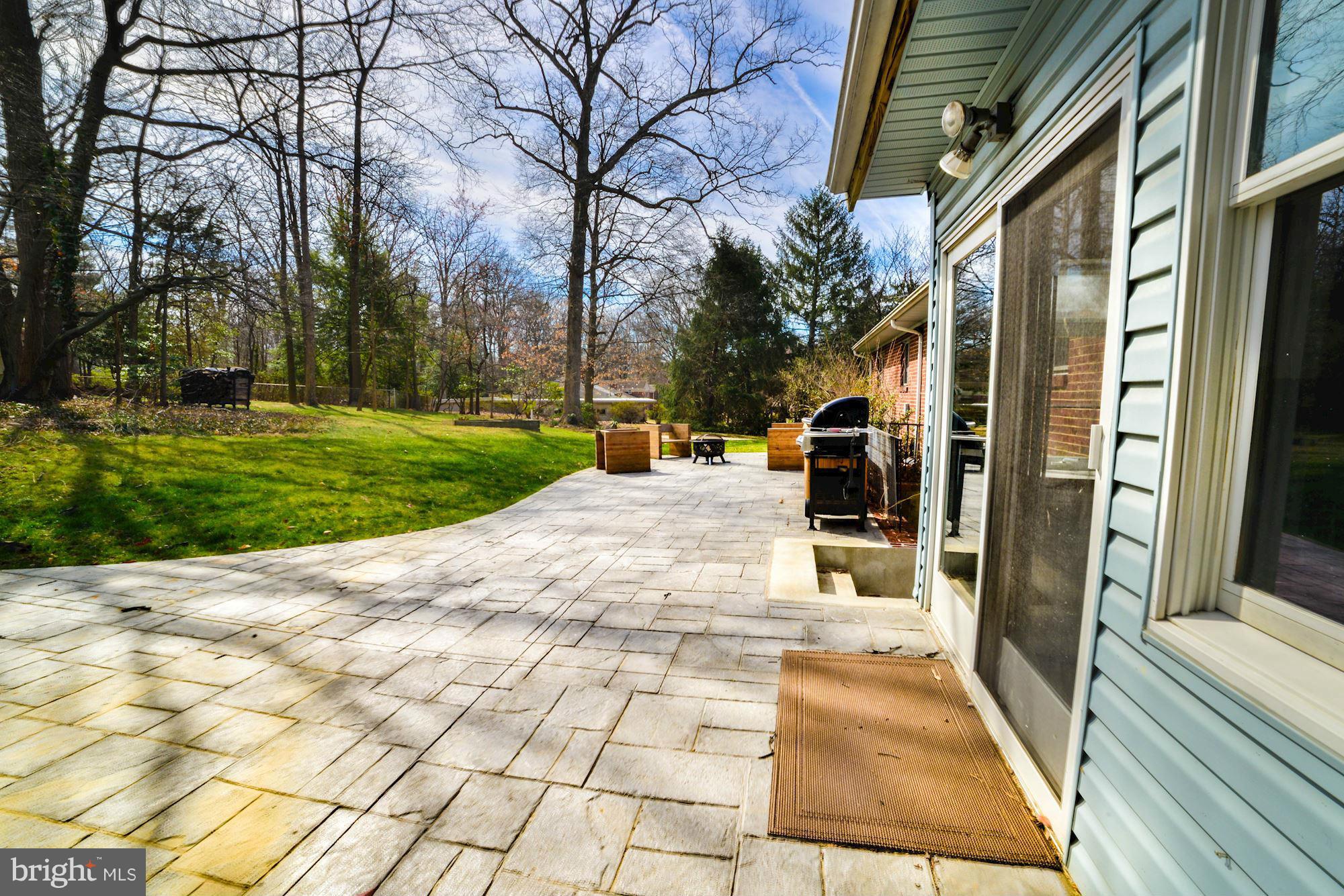 1301 Chalmers Road Silver Spring, MD 20903 - Photo 3 of 28 a view of a pathway with a trees