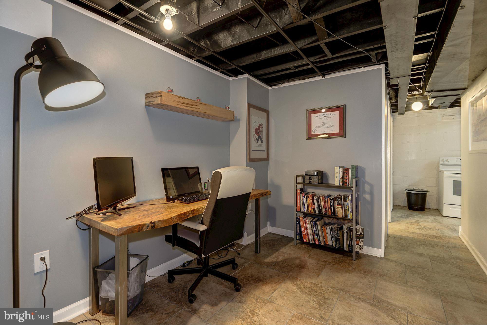 1301 Chalmers Road Silver Spring, MD 20903 - Photo 23 of 28 a view of a workspace with furniture