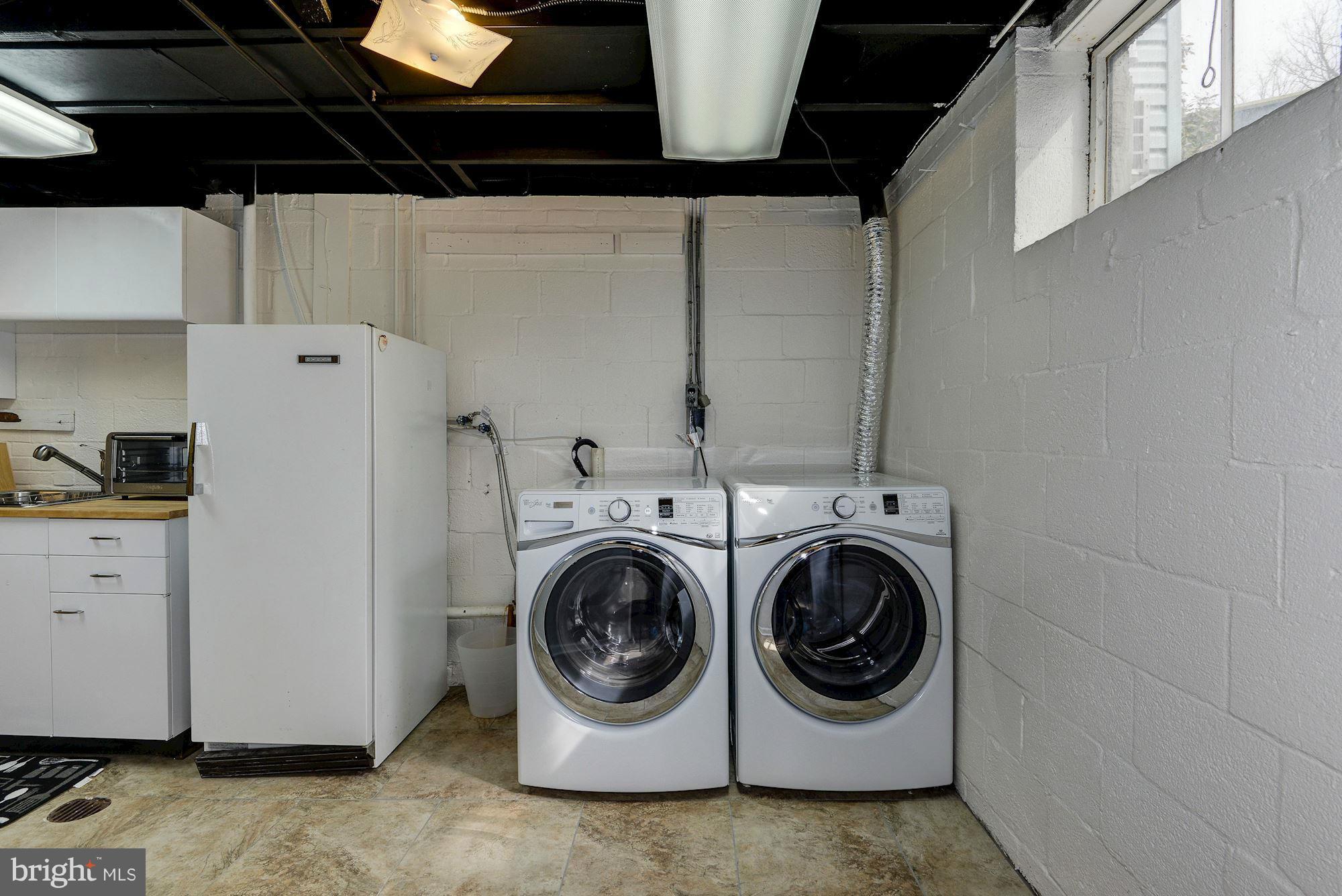 1301 Chalmers Road Silver Spring, MD 20903 - Photo 25 of 28 a utility room with dryer and washer