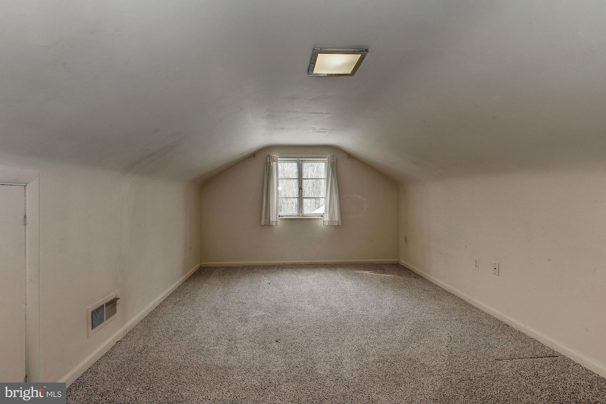 1301 Chalmers Road Silver Spring, MD 20903 - Photo 27 of 28 an empty room with a window