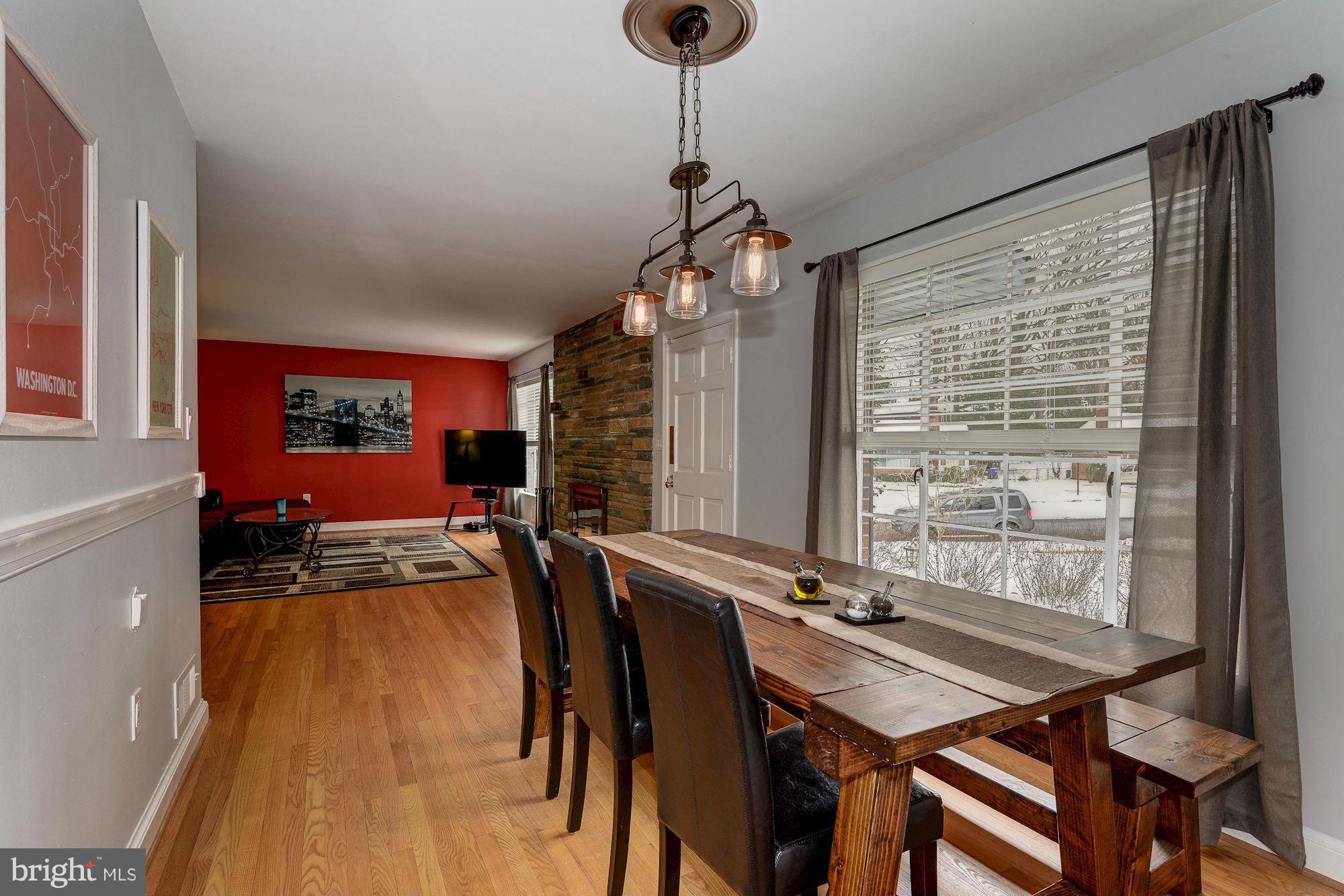 1301 Chalmers Road Silver Spring, MD 20903 - Photo 9 of 28 a view of a dining room with furniture window and outside view