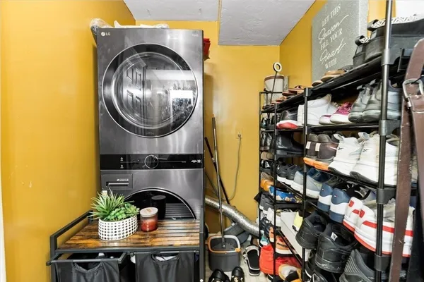 a kitchen with refrigerator and microwave