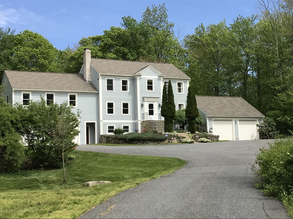 95 George Hill Road Grafton, MA 01519 - Photo 1 of 24 a front view of a house with a yard