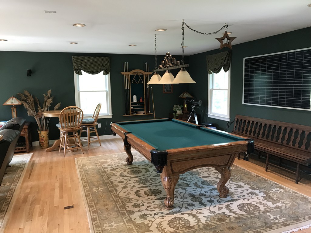 95 George Hill Road Grafton, MA 01519 - Photo 12 of 24 a living room with furniture pool table and a fireplace