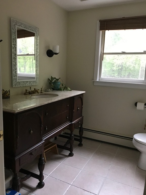 95 George Hill Road Grafton, MA 01519 - Photo 17 of 24 a room with a window and a toilet