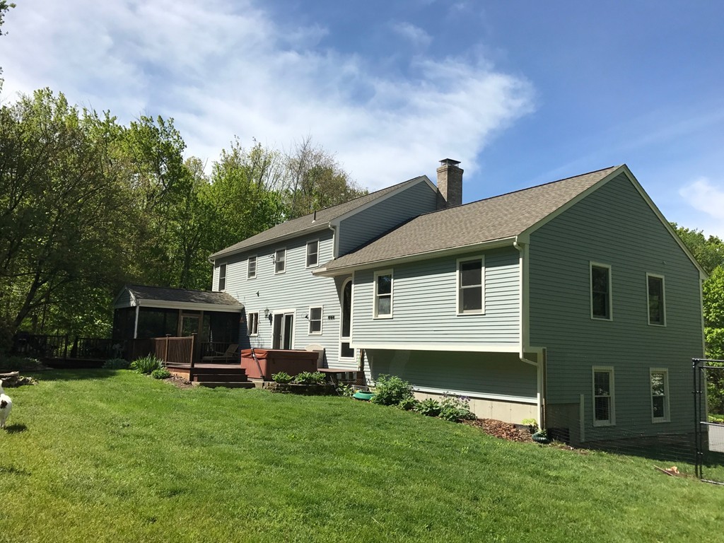 95 George Hill Road Grafton, MA 01519 - Photo 22 of 24 a view of a house with backyard porch and garden