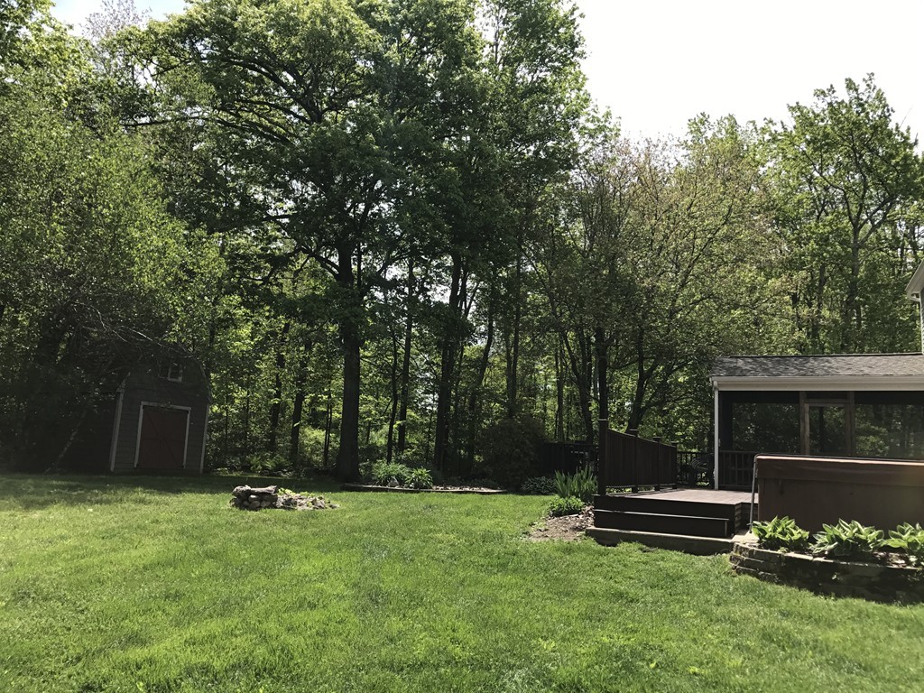 95 George Hill Road Grafton, MA 01519 - Photo 24 of 24 a view of outdoor space with deck and yard