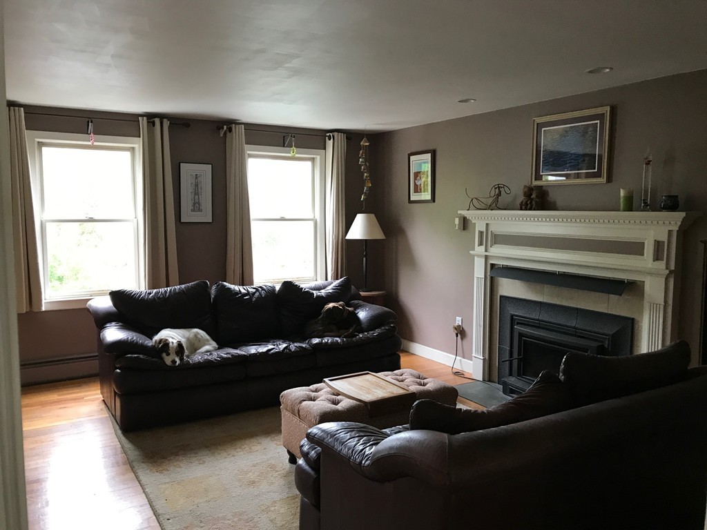 95 George Hill Road Grafton, MA 01519 - Photo 5 of 24 a living room with furniture and a fireplace