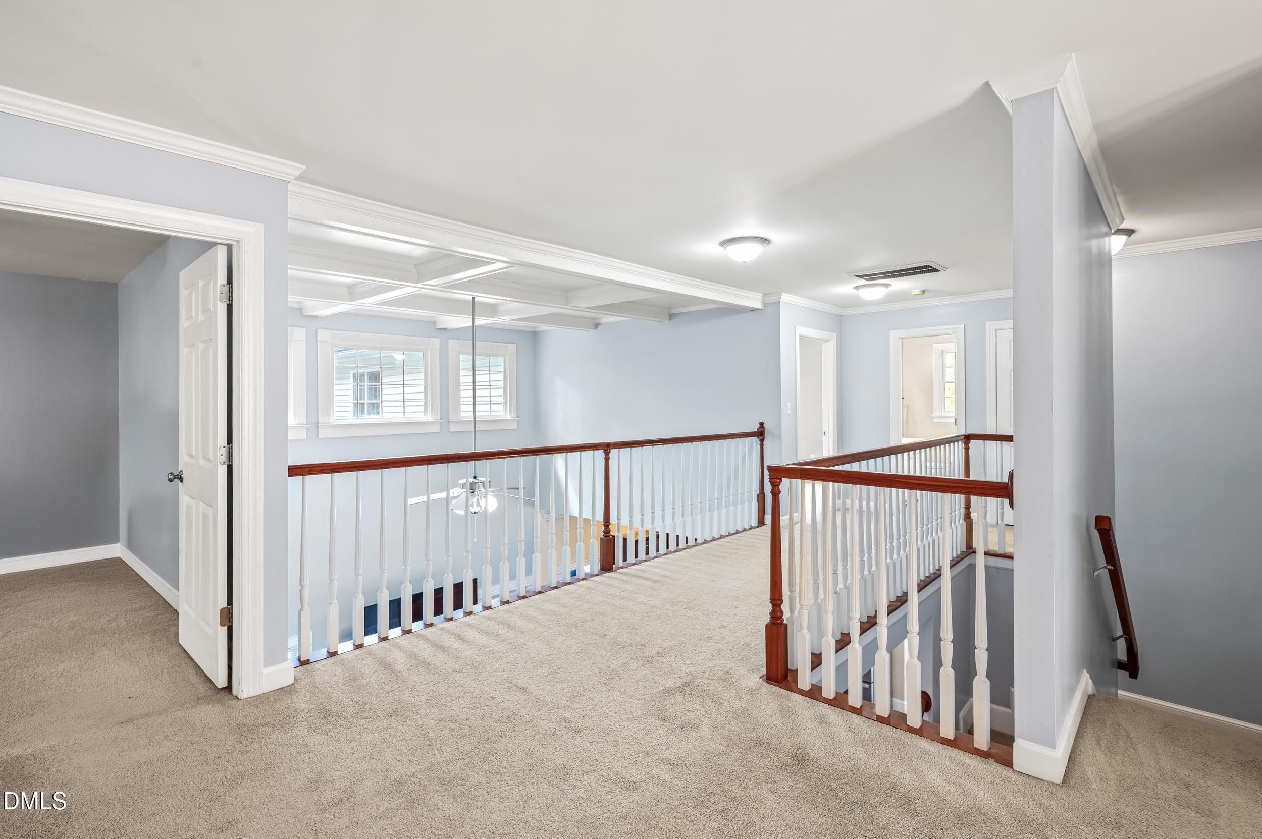 1957 Hilltop Road Raleigh, NC 27610 - Photo 20 of 46 a view of a hallway with staircase