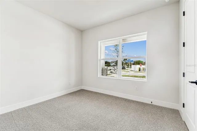 a white toilet sitting next to a bath tub