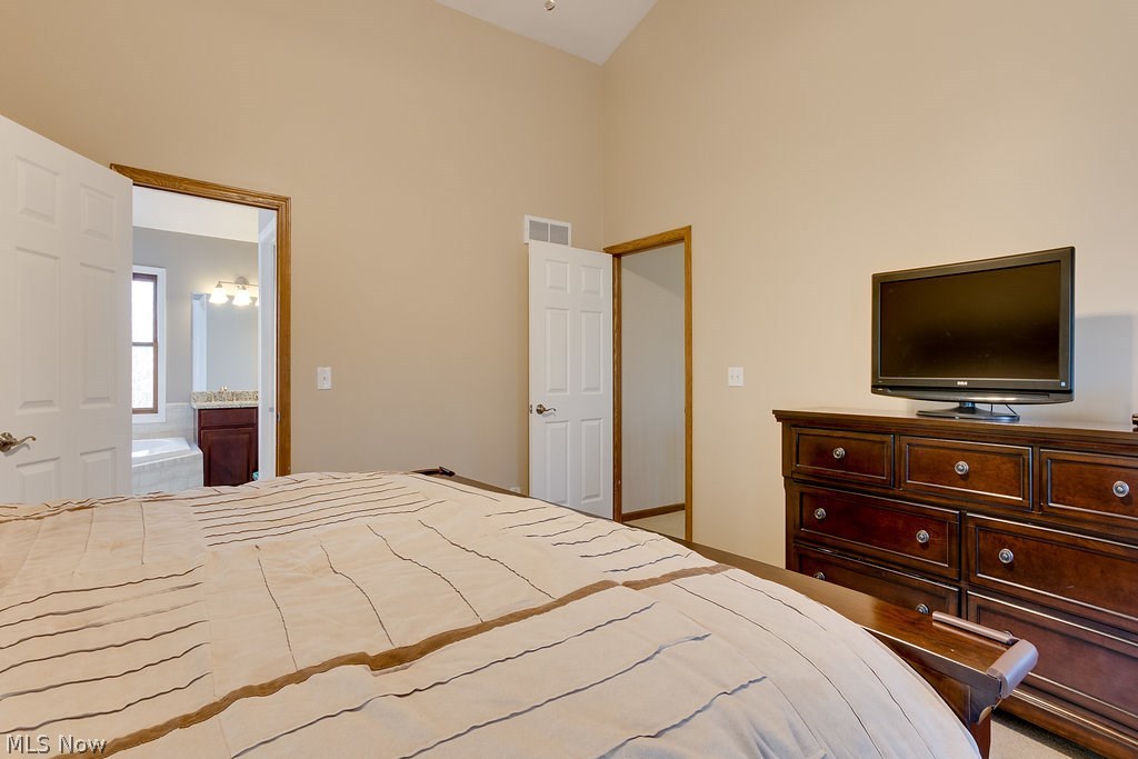 11655 Kile Road Chardon, OH 44024 - Photo 29 of 35 Master Bedroom - showing entrance to master bath and hallway