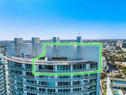 a view of a tall building with a outdoor space