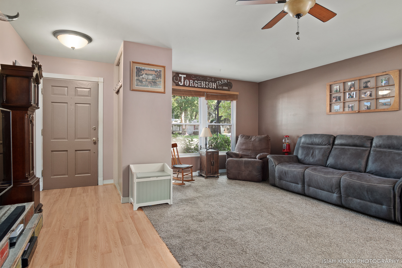 8 Hampton Road Montgomery, IL 60538 - Photo 11 of 26 a living room with furniture and a flat screen tv