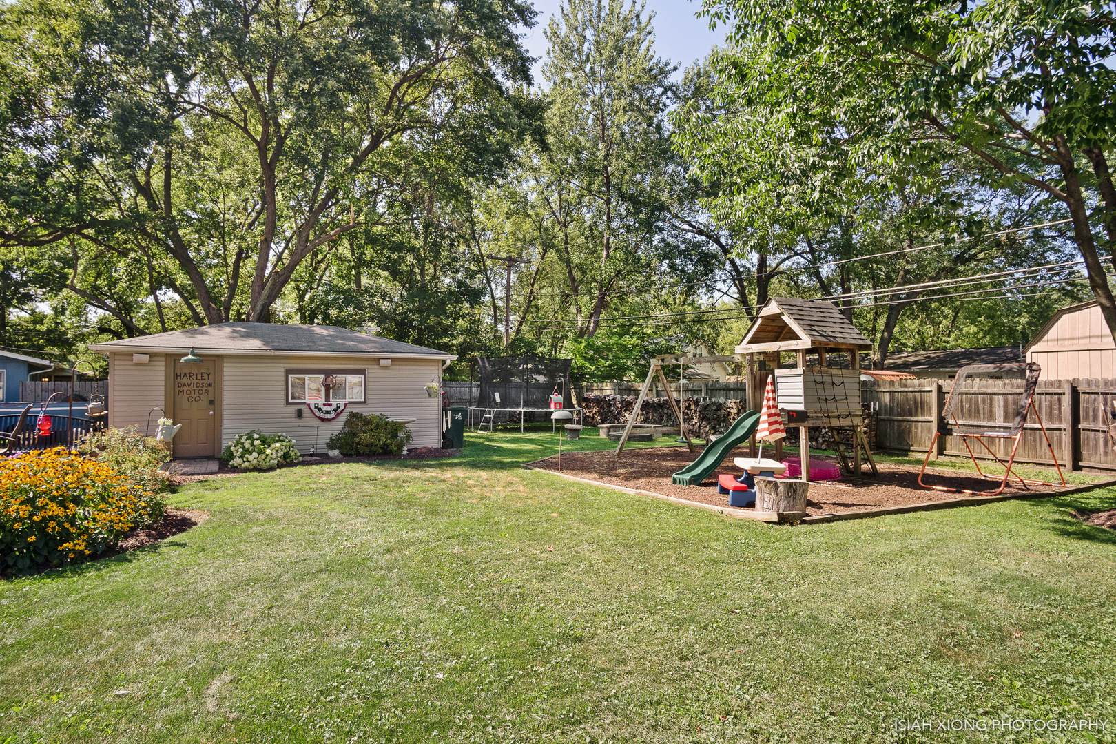 8 Hampton Road Montgomery, IL 60538 - Photo 25 of 26 a view of a house with a backyard and a tree