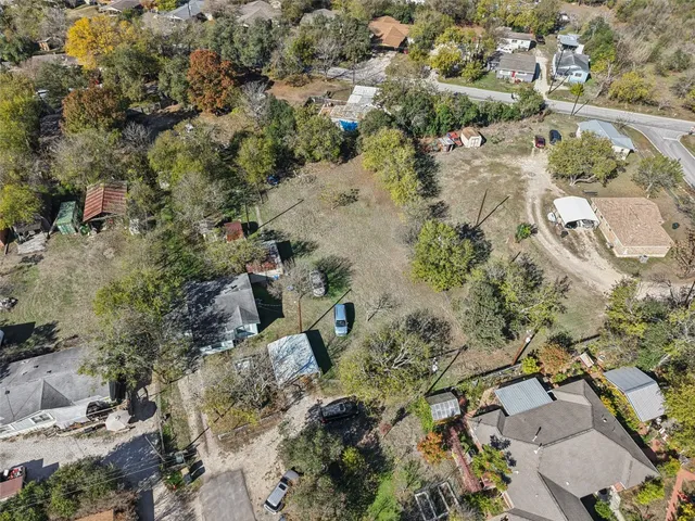 an aerial view of residential house with outdoor space