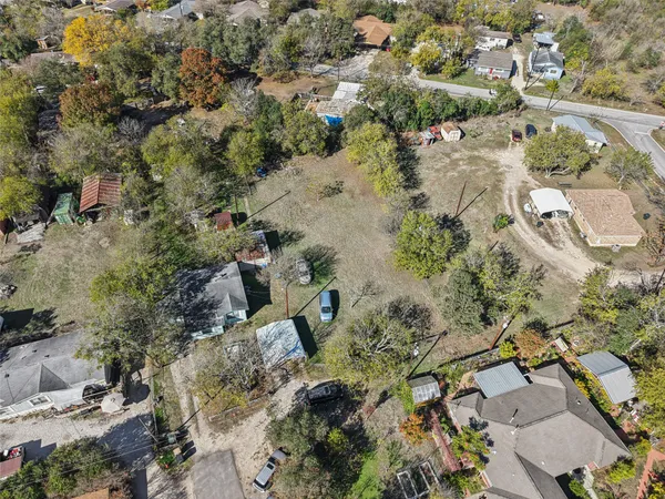 an aerial view of residential house with outdoor space