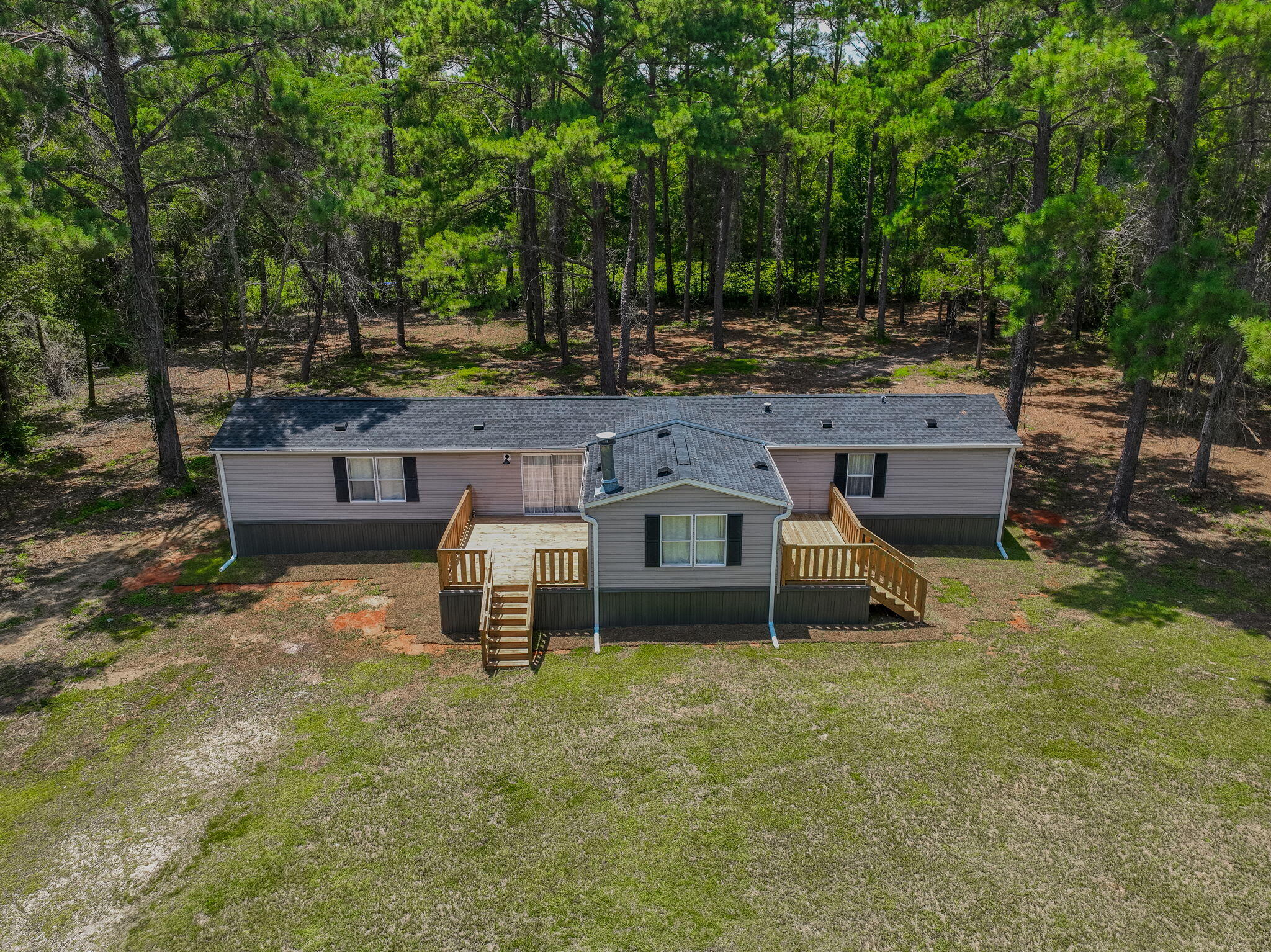 5216 Galiver Cutoff Baker, FL 32531 - Photo 12 of 51 an aerial view of a house with a yard
