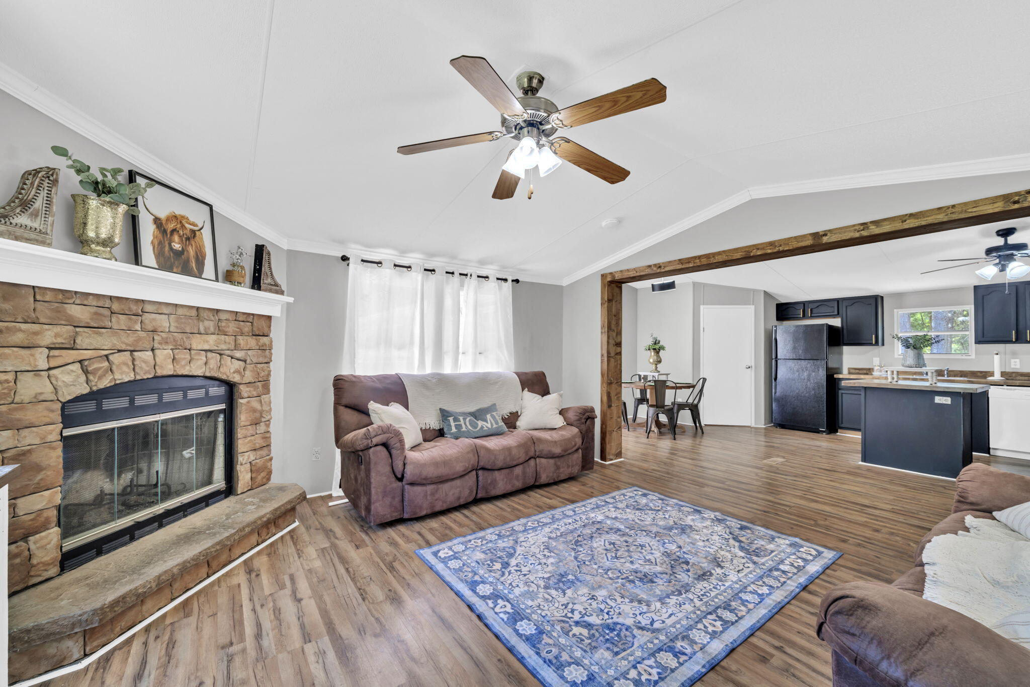 5216 Galiver Cutoff Baker, FL 32531 - Photo 18 of 51 a living room with furniture and a fireplace