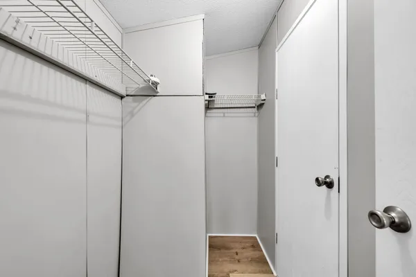 a view of a room with rack on the wall