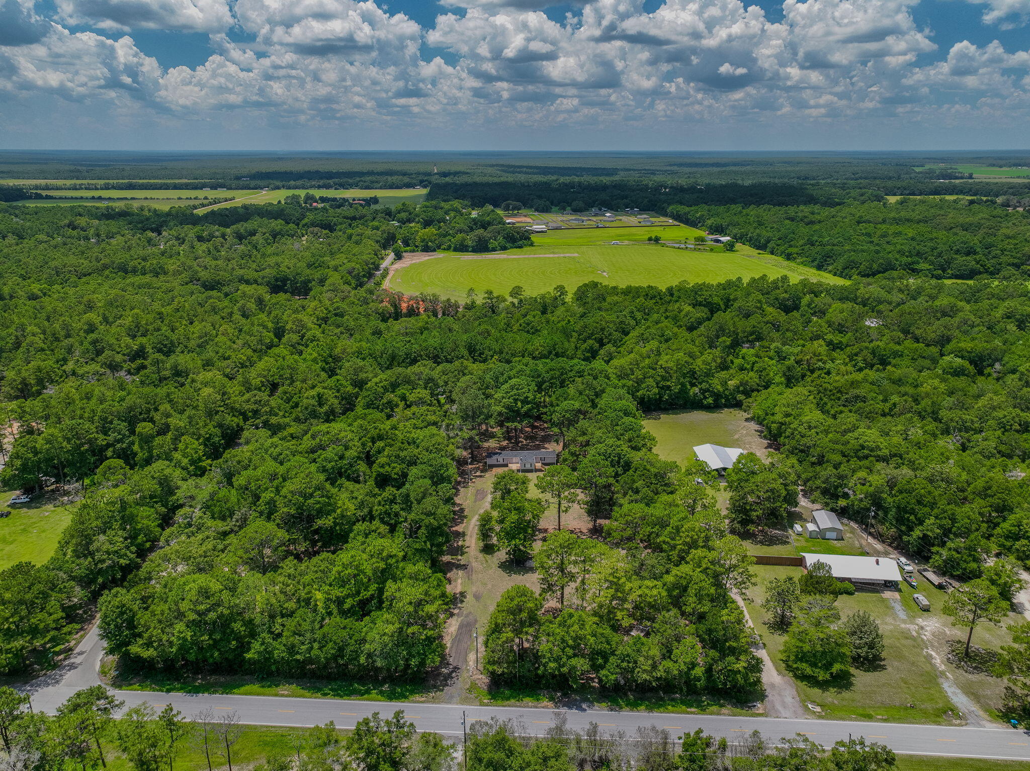 5216 Galiver Cutoff Baker, FL 32531 - Photo 45 of 51 a view of a water pond with green space
