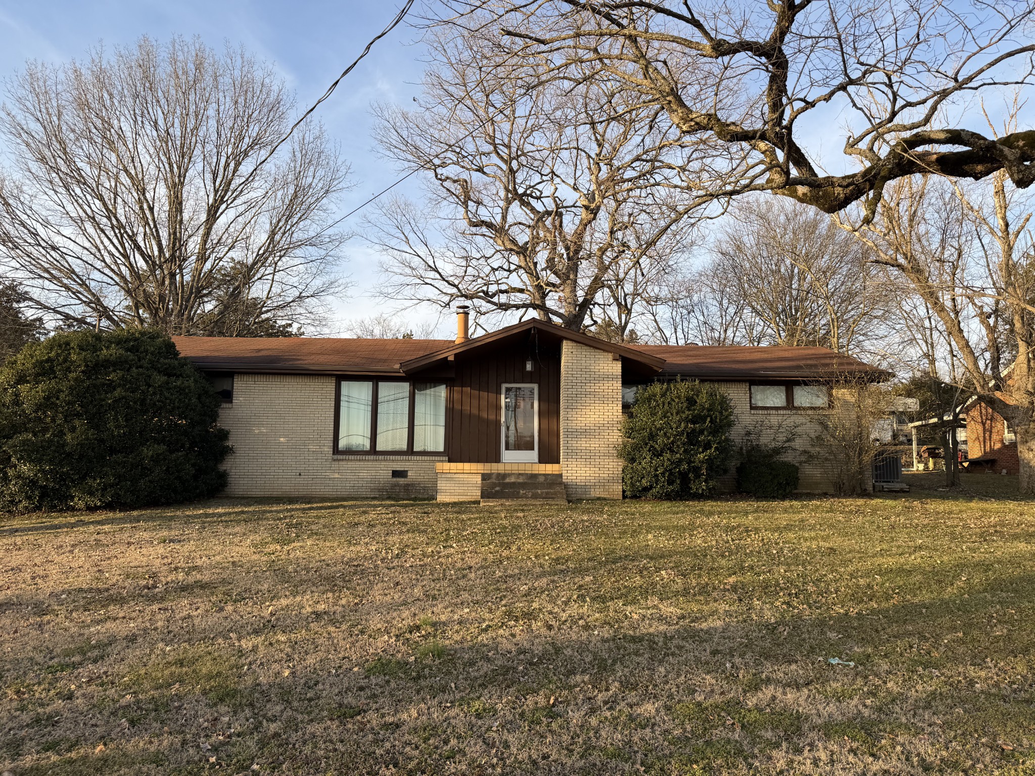 10555 Lebanon Road Mount Juliet, TN 37122 - Photo 1 of 15 a house that has a tree in front of it