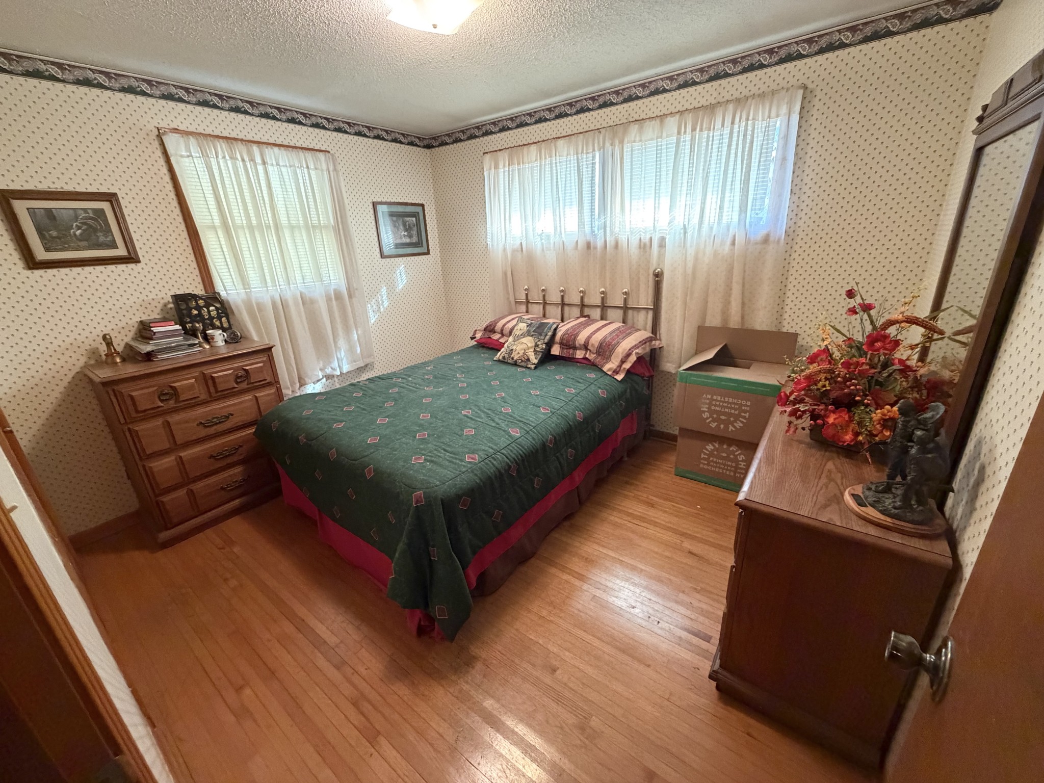 10555 Lebanon Road Mount Juliet, TN 37122 - Photo 12 of 15 a bed sitting in a room next to a window