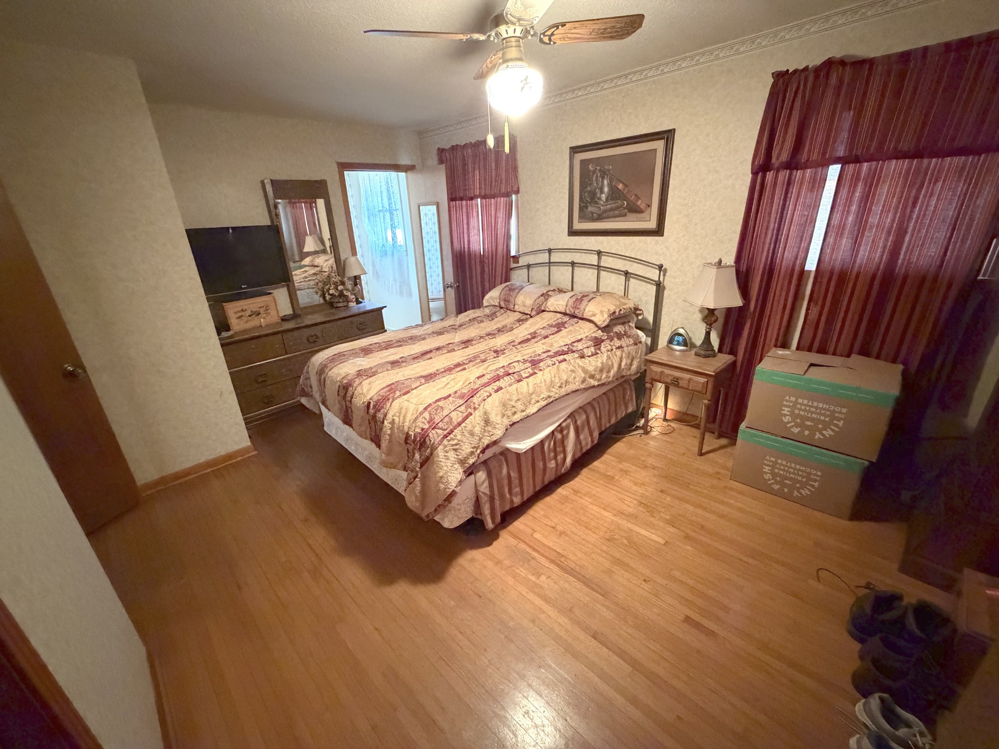 10555 Lebanon Road Mount Juliet, TN 37122 - Photo 9 of 15 a bedroom with a bed cabinet and a mirror