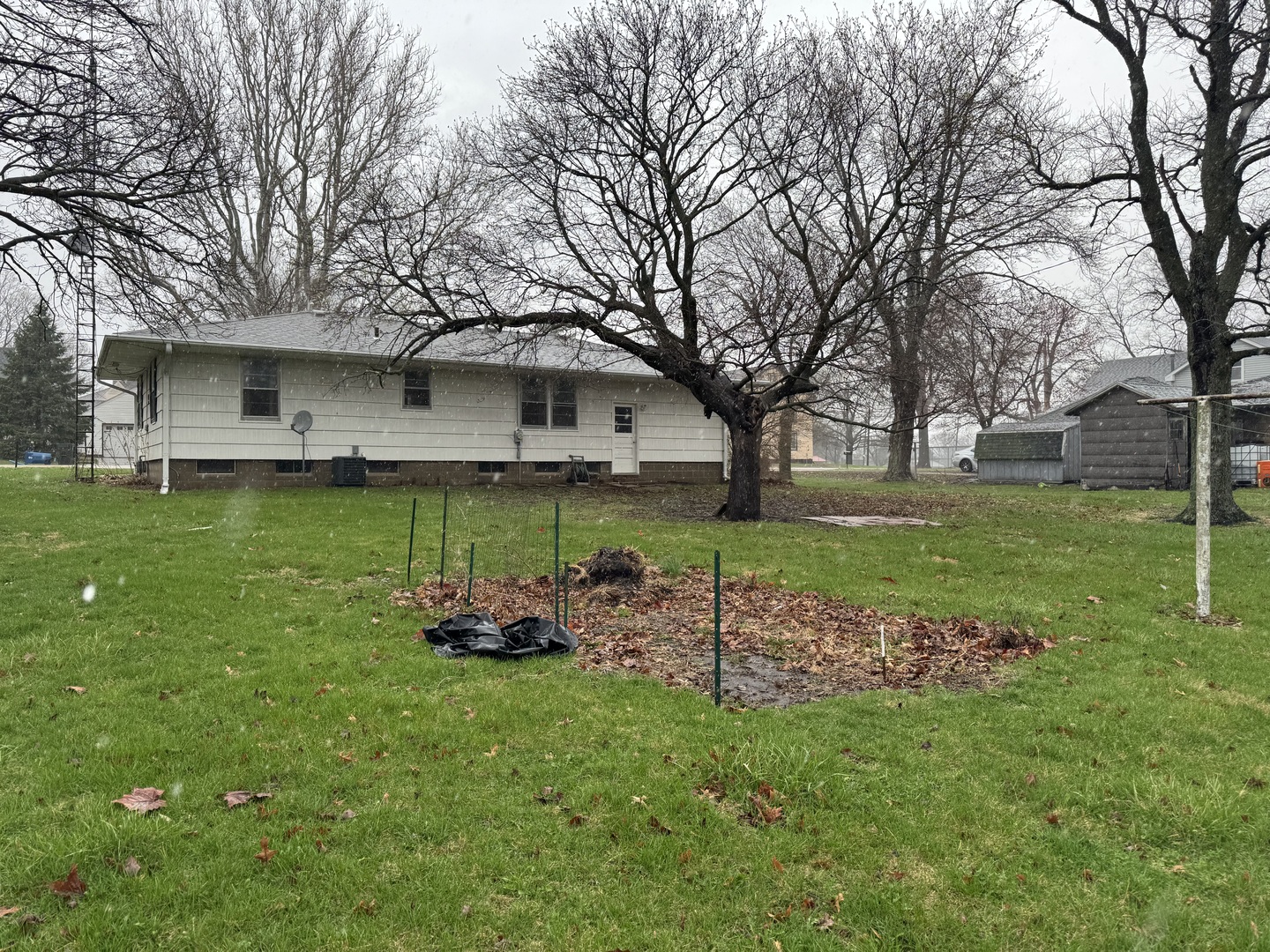 101 West High Street La Moille, IL 61330 - Photo 31 of 34 a front view of a house with garden
