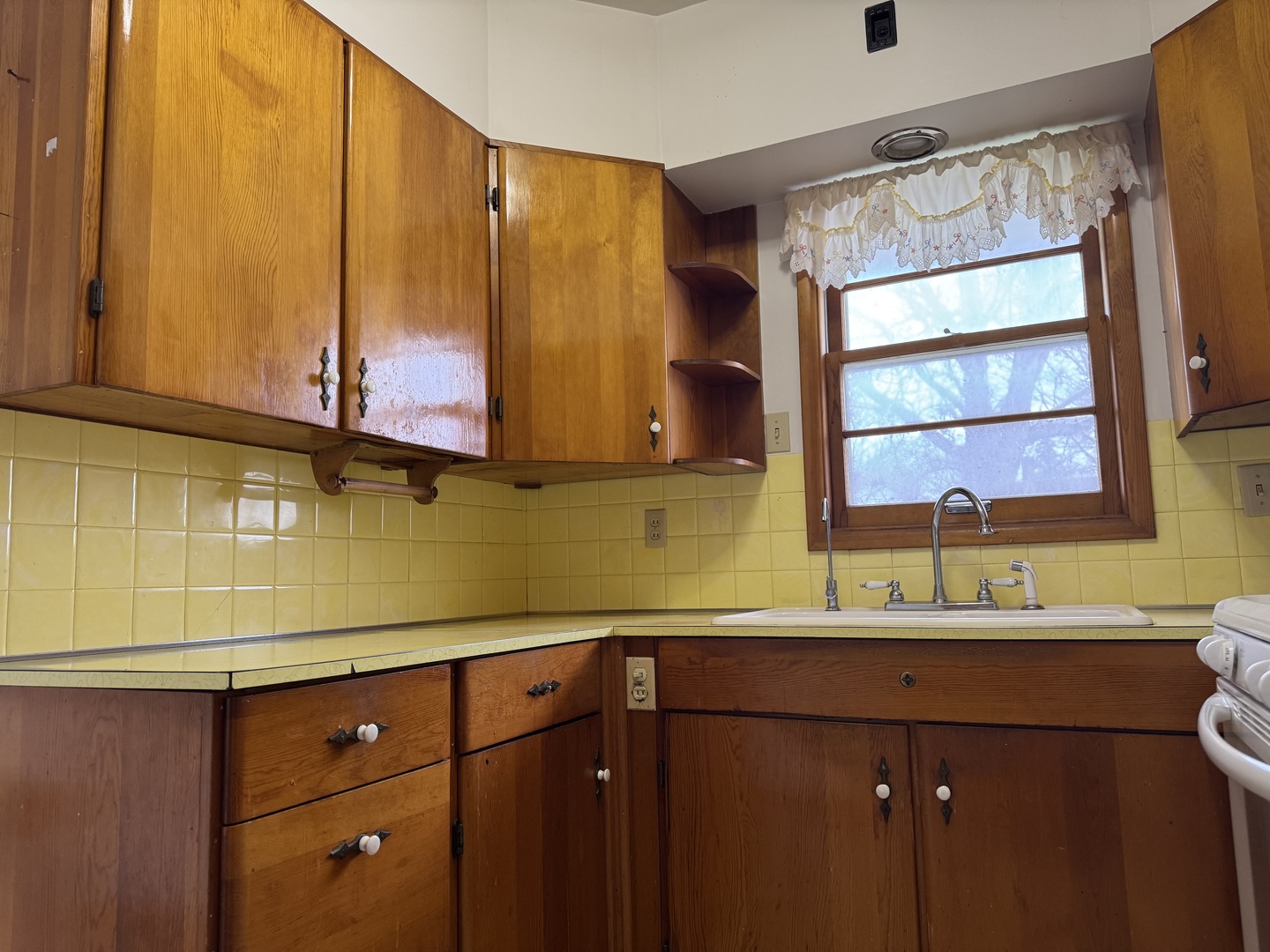 101 West High Street La Moille, IL 61330 - Photo 8 of 34 a kitchen with a sink and a window