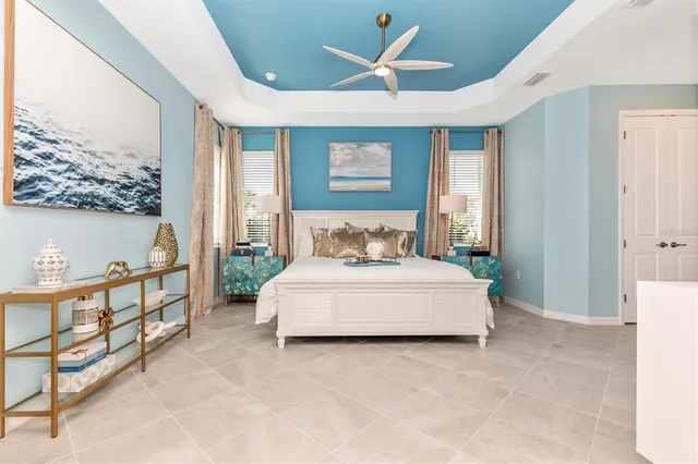 a bathroom with a bathtub a sink and a mirror