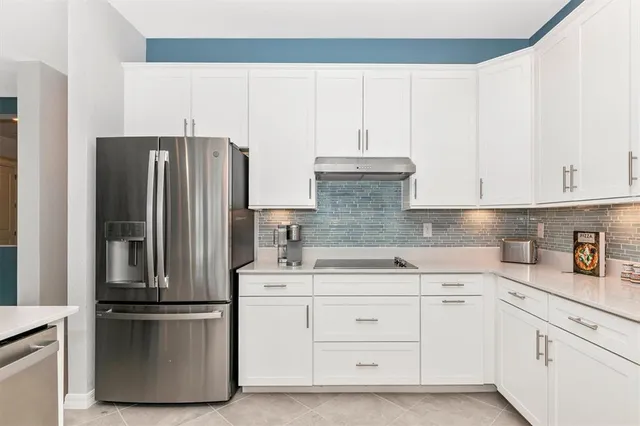 a bed room with furniture and a window