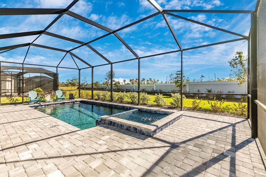 17180 Jadestone Court Venice, FL 34293 - Photo 41 of 98 a view of a swimming pool with a patio and swimming pool