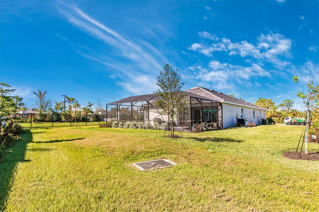 17180 Jadestone Court Venice, FL 34293 - Photo 53 of 98 a view of a house with swimming pool and sitting area