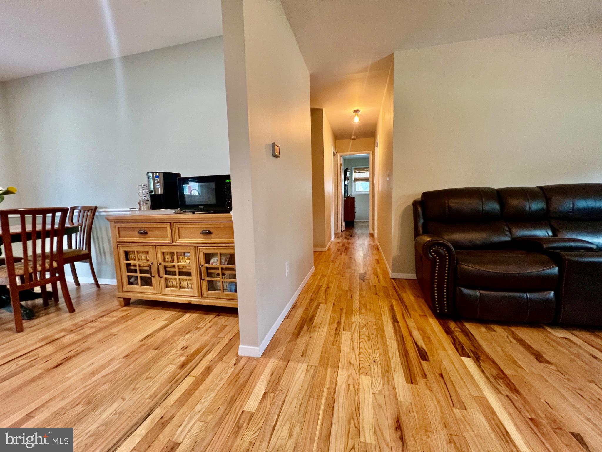 4 Running Brook Road Ewing, NJ 08638 - Photo 7 of 46 Inviting space with warm wood floors.
