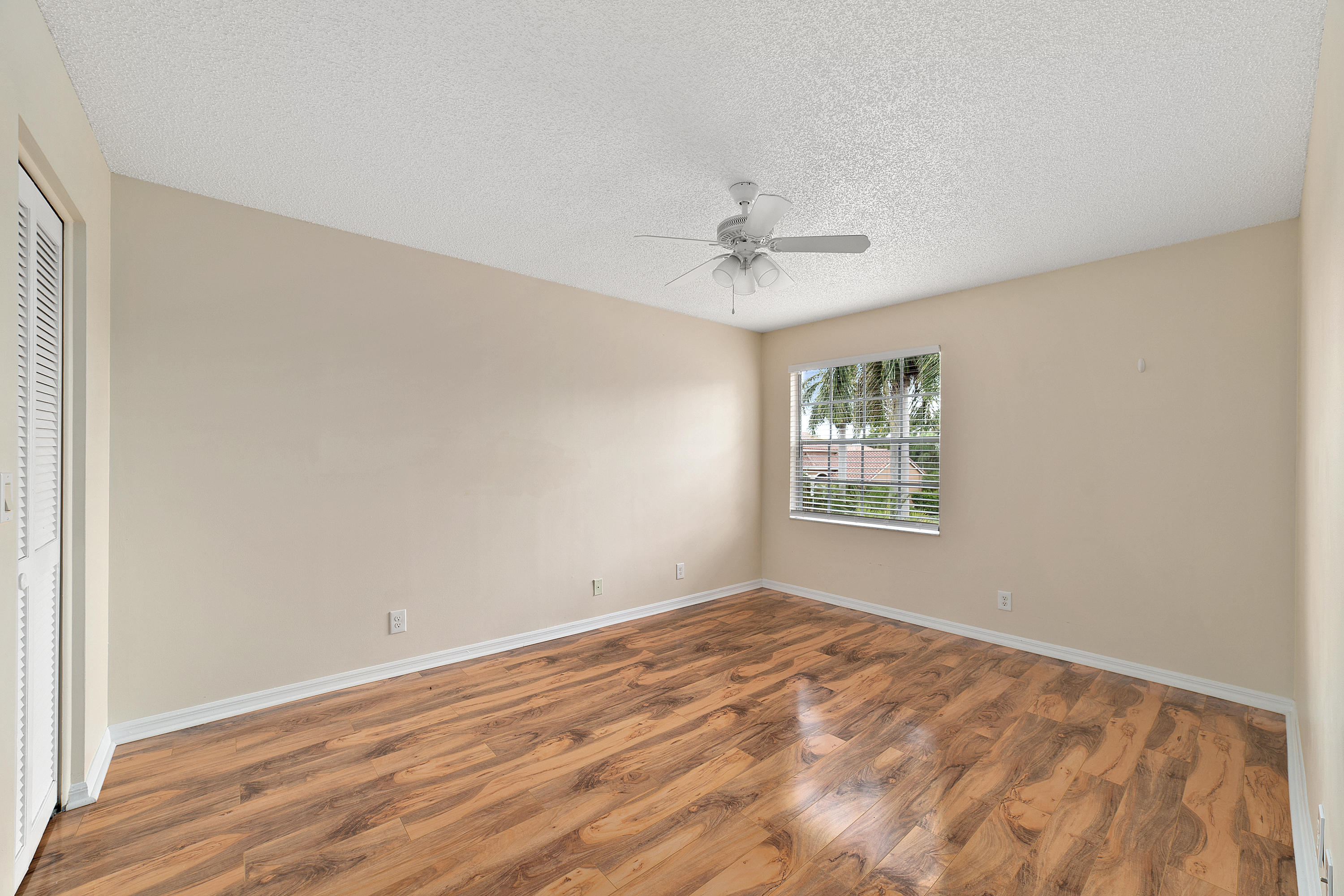 19554 Black Olive Lane Boca Raton, FL 33498 - Photo 24 of 40 a view of an empty room with a window