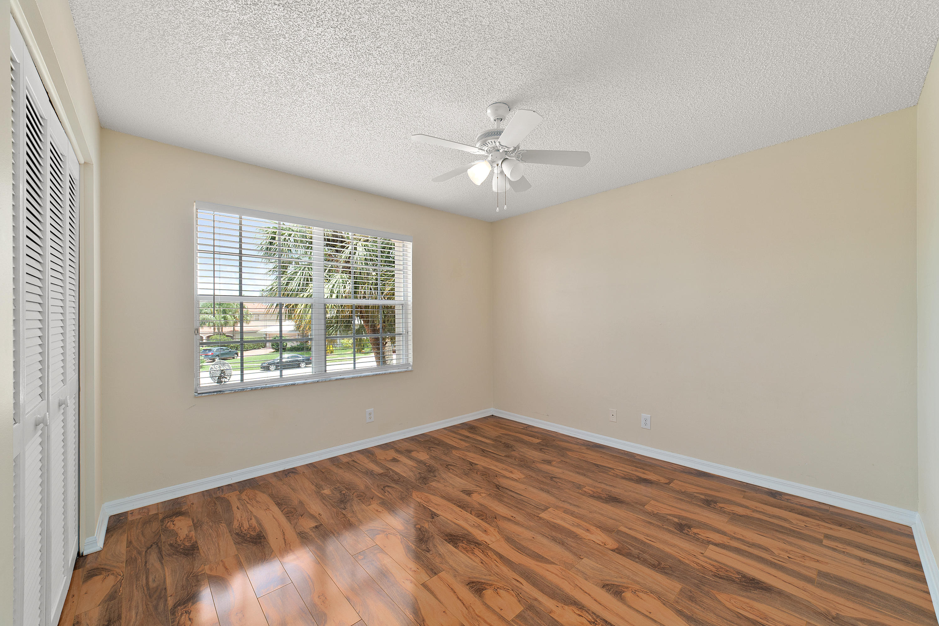 19554 Black Olive Lane Boca Raton, FL 33498 - Photo 27 of 40 a view of an empty room with a window