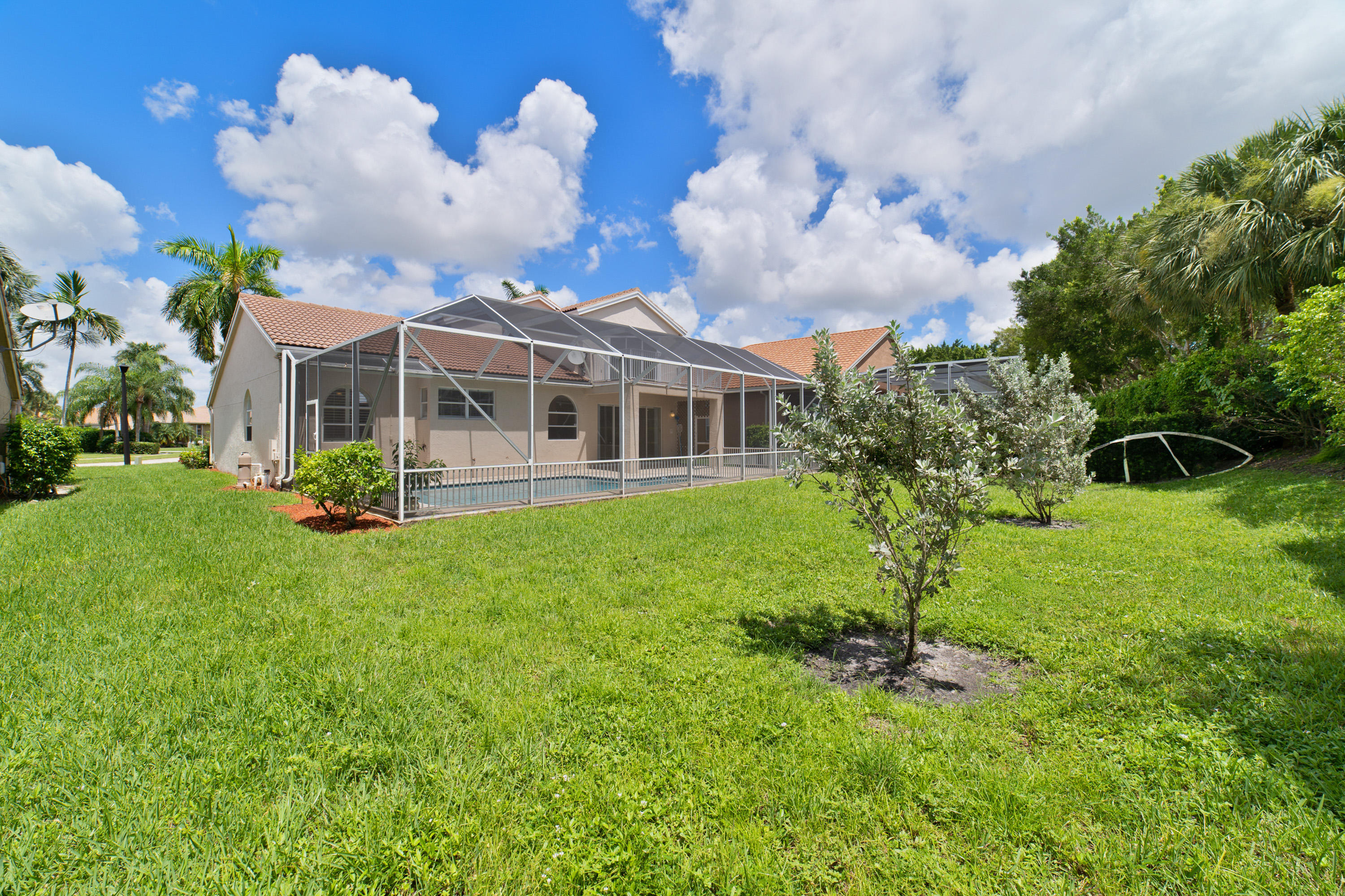 19554 Black Olive Lane Boca Raton, FL 33498 - Photo 35 of 40 a front view of a house with garden