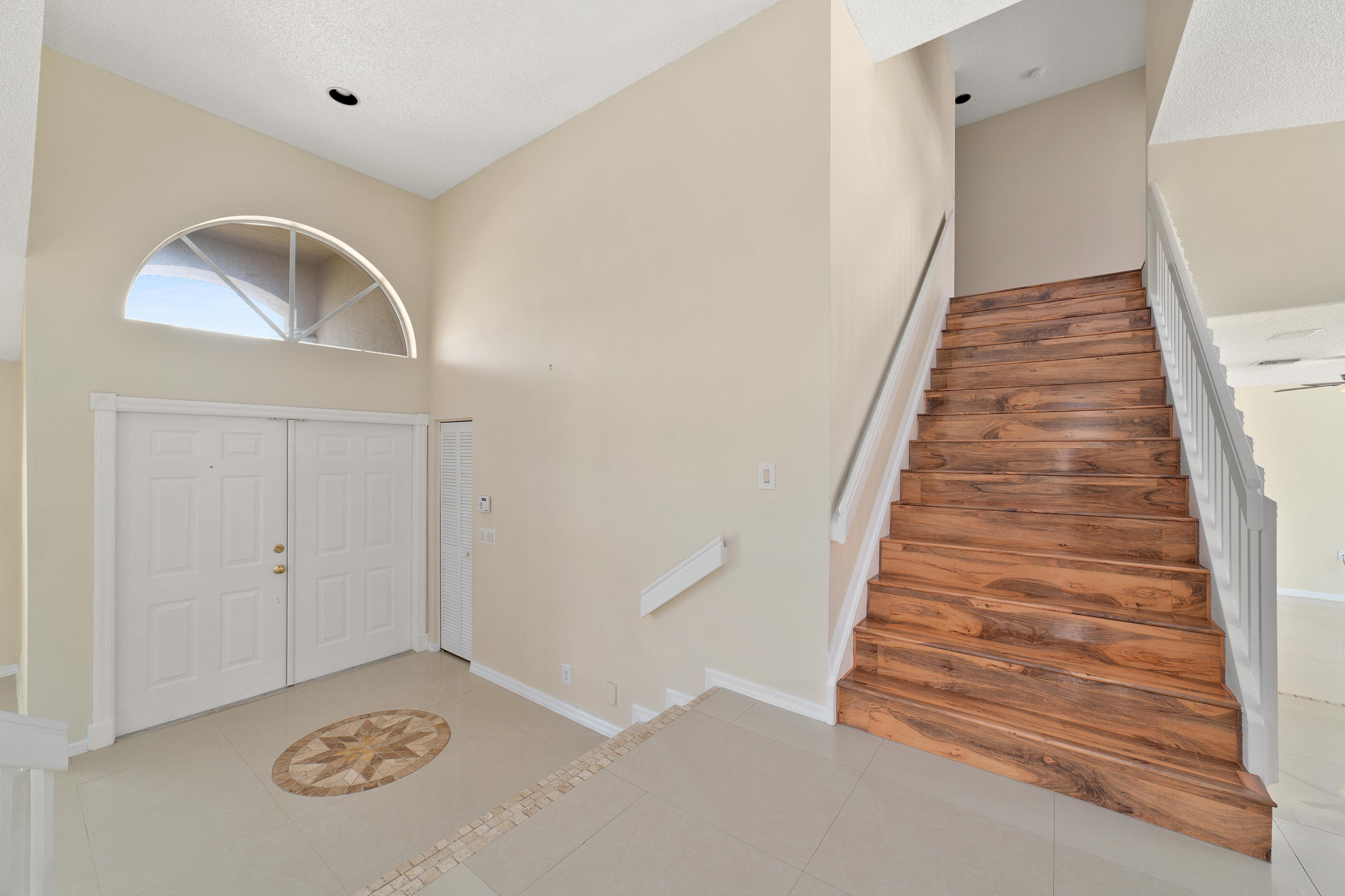 19554 Black Olive Lane Boca Raton, FL 33498 - Photo 5 of 40 a view of a hallway with entryway