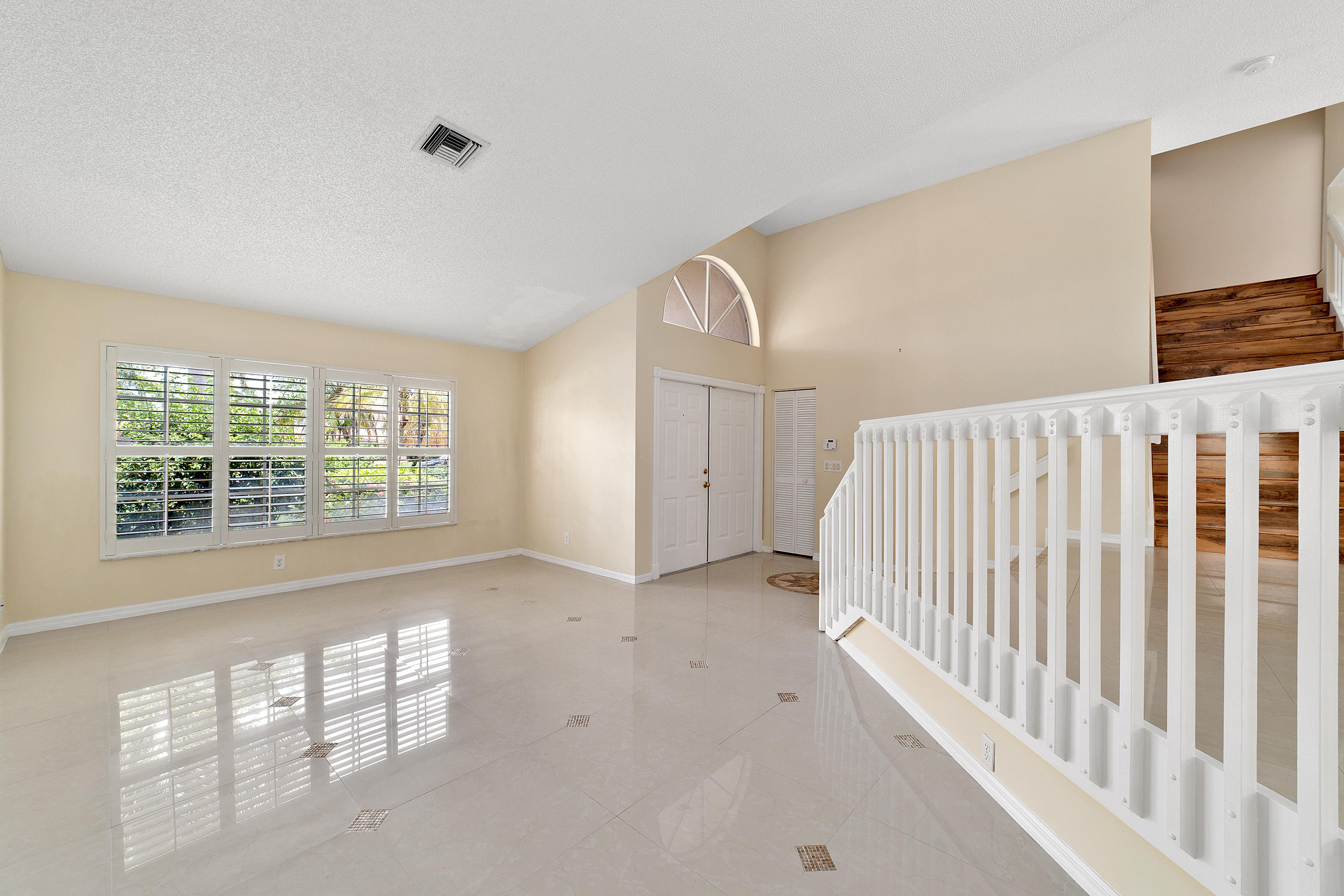 19554 Black Olive Lane Boca Raton, FL 33498 - Photo 7 of 40 a view of an empty room with a window