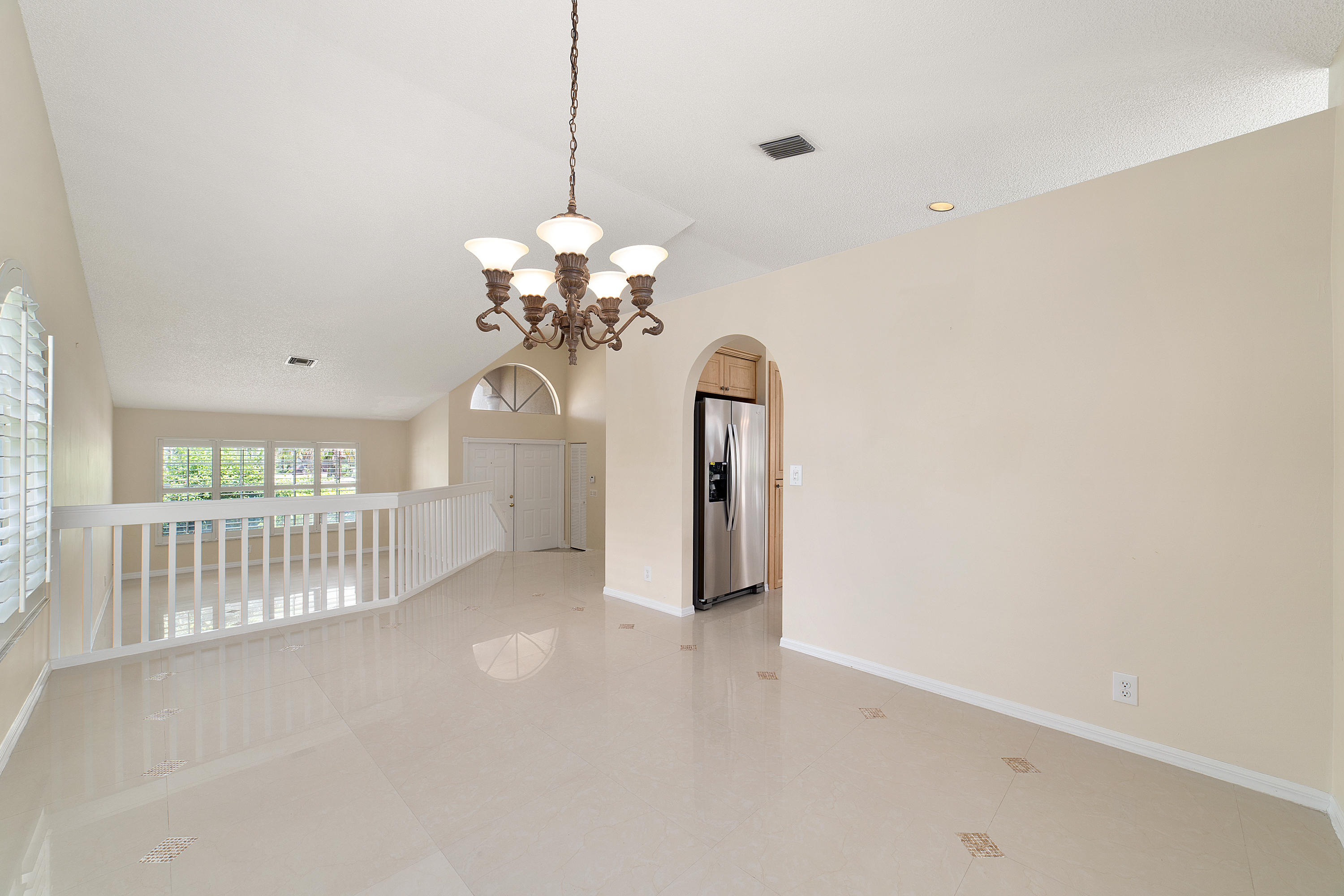 19554 Black Olive Lane Boca Raton, FL 33498 - Photo 9 of 40 a view of a chandelier and chandelier in a room