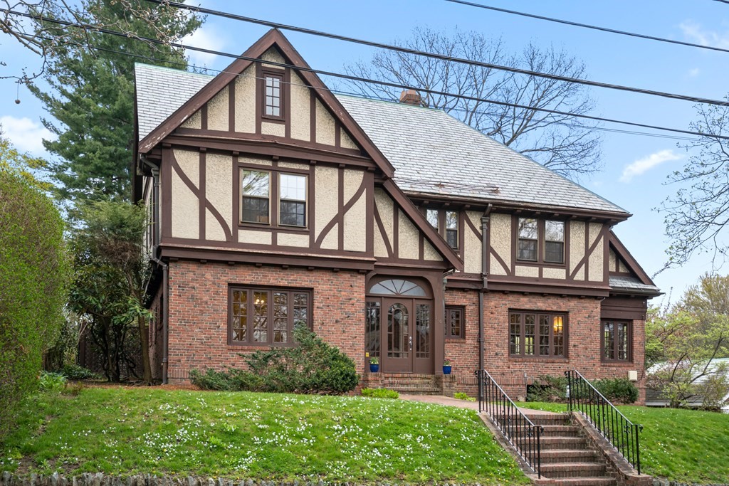 110 Cedar Street Newton, MA 02459 - Photo 1 of 28 a front view of a house with garden
