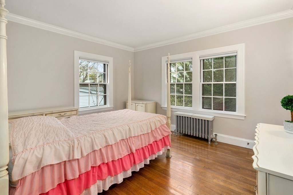 110 Cedar Street Newton, MA 02459 - Photo 17 of 28 a bedroom with a bed and a window with outer view