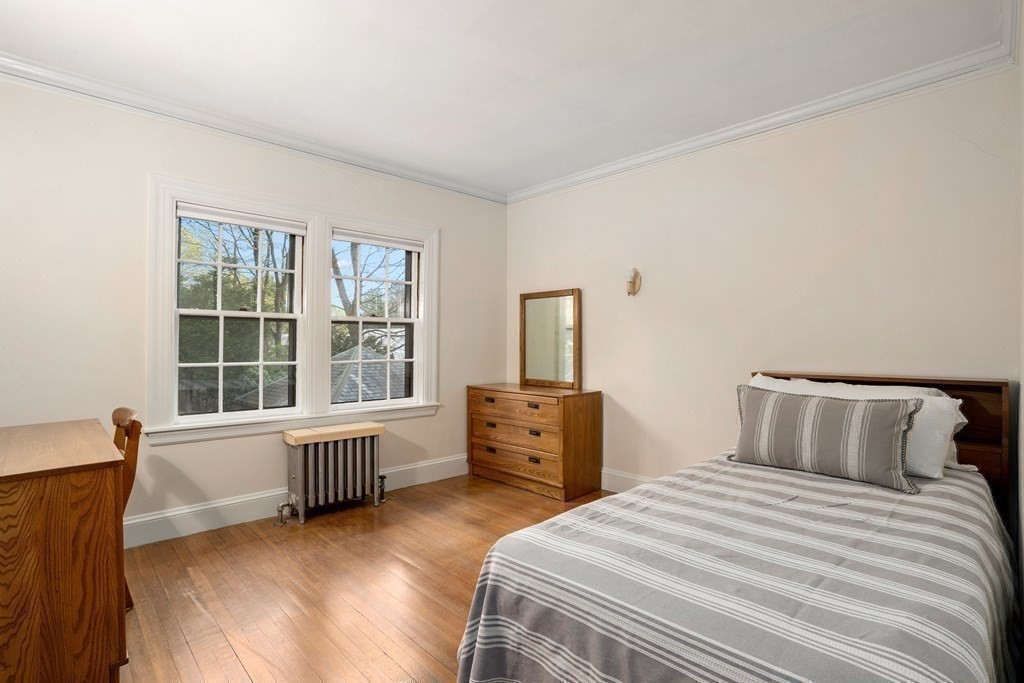 110 Cedar Street Newton, MA 02459 - Photo 18 of 28 a bedroom with furniture and windows