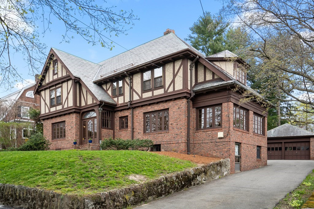 110 Cedar Street Newton, MA 02459 - Photo 2 of 28 a front view of a house with garden
